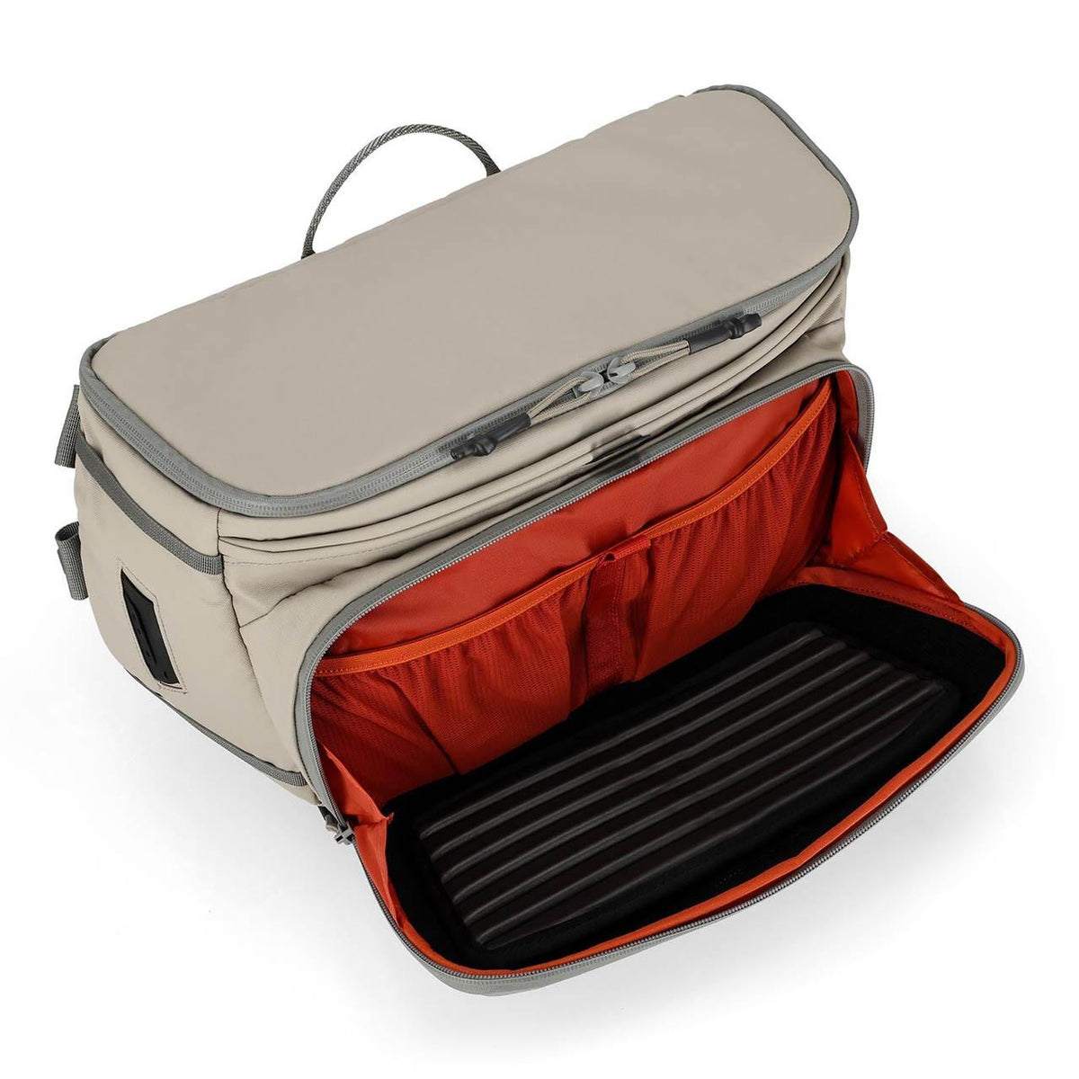 Open pack showing interior compartments and fishing gear storage. Accessories pictured may not be included.