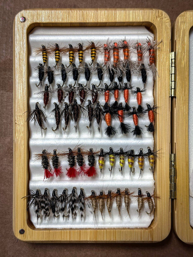 Fly box loaded with nymphs and dry flies