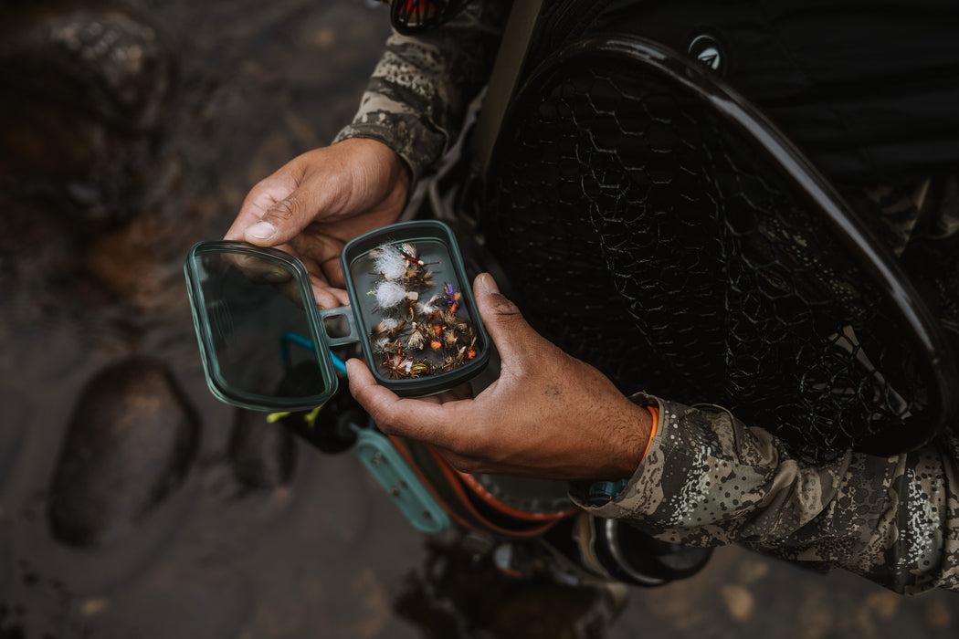 Fishpond Predator Fly Puck open with fishing flies inside