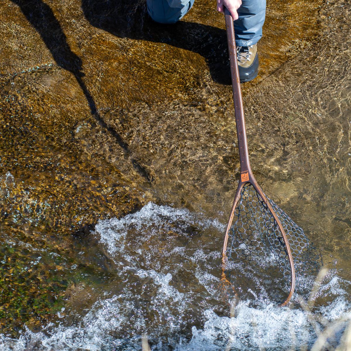 Fishpond Nomad Yampa Guide Net River Armor 2.0 used while wading